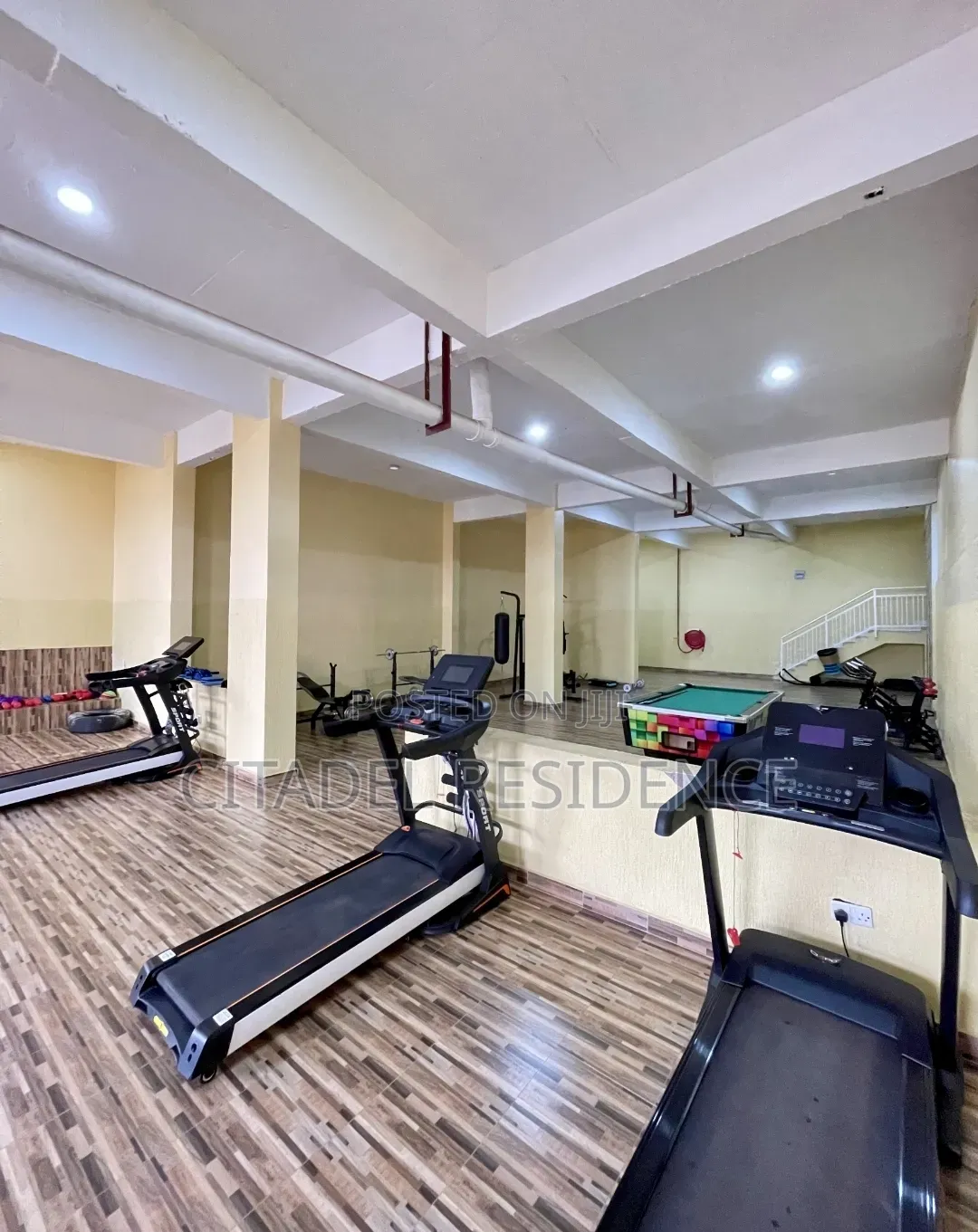Elegant 2-Bedroom Airbnb Suite With Full Kitchen, Pool & Gym