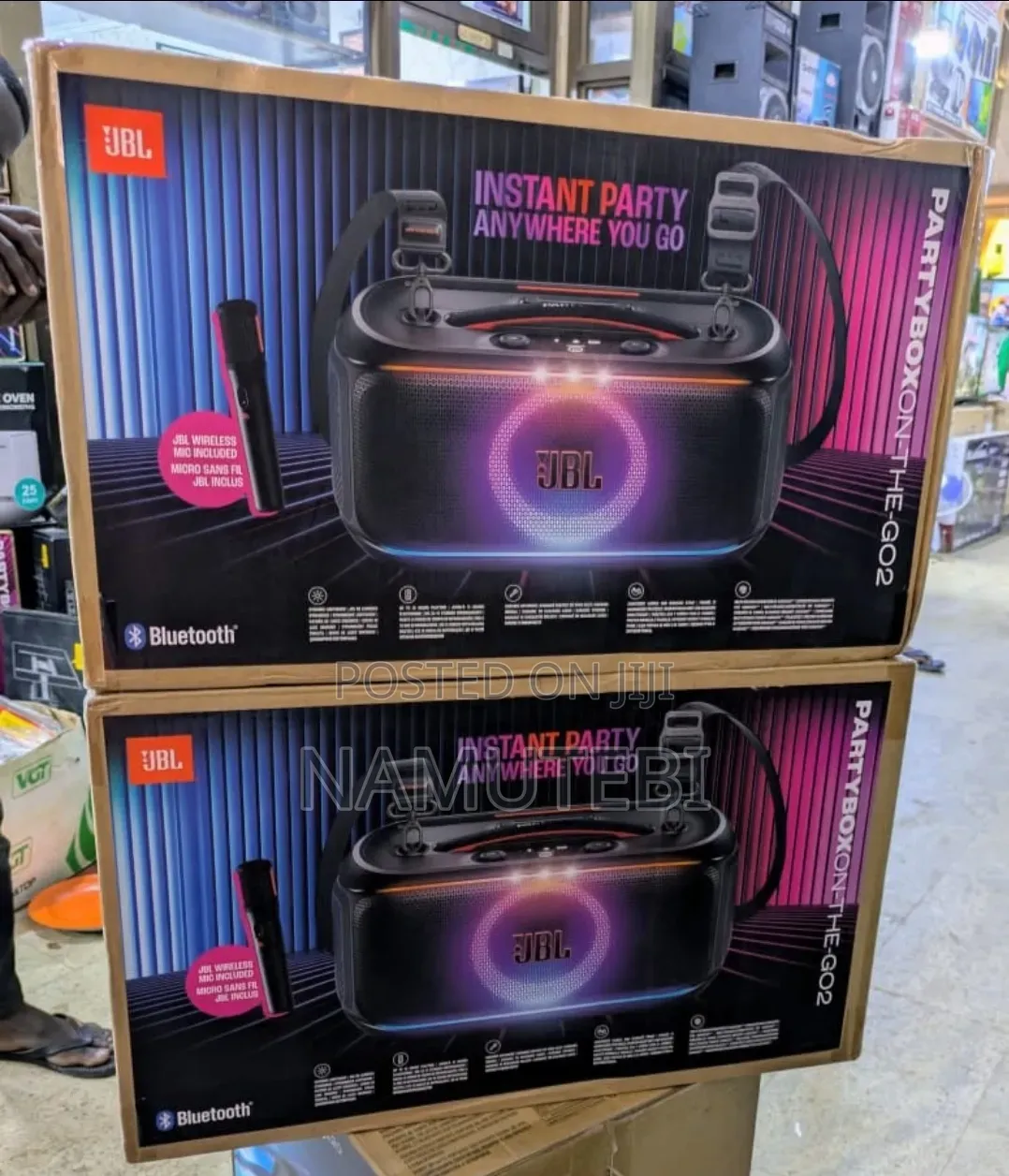 JBL PartyBox on-the-Go 2 Party Speaker, With a Wireless Microphone.