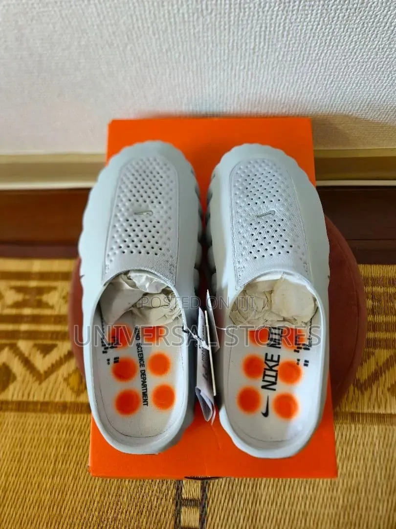 Nike Mind 001 Slip-on Mules/Slides in a Light Grey Colorway