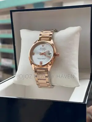 Rolex Oyster Perpetual Datejust Wrist Watch in a Rose Gold