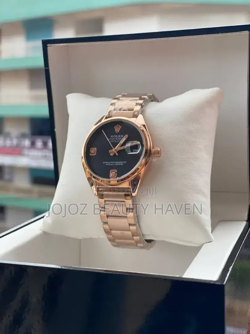 Rolex Oyster Perpetual Datejust Wrist Watch in a Rose Gold