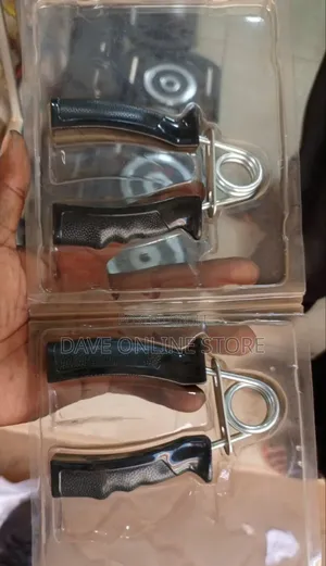 Pair of Black Plastic and Steel Spring Hand Grip Exercisers.