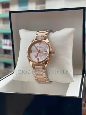 Rolex Oyster Perpetual Datejust Wrist Watch in a Rose Gold