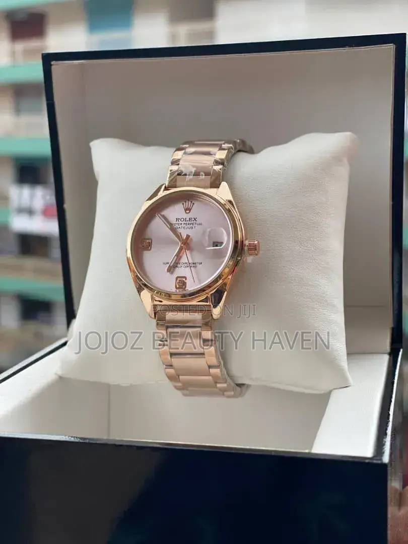 Rolex Oyster Perpetual Datejust Wrist Watch in a Rose Gold