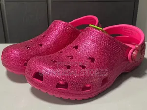 Hot Pink Glitter Crocs Classic Clogs.