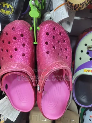 Hot Pink Glitter Crocs Classic Clogs.