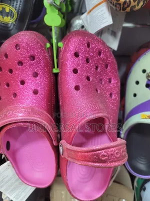 Hot Pink Glitter Crocs Classic Clogs.
