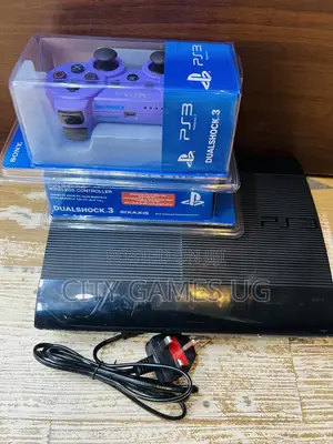 Uk Used PlayStation 3 Super Slim Console Black With Cables and Games