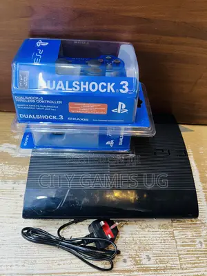 Uk Used PlayStation 3 Super Slim Console Black With Cables and Games