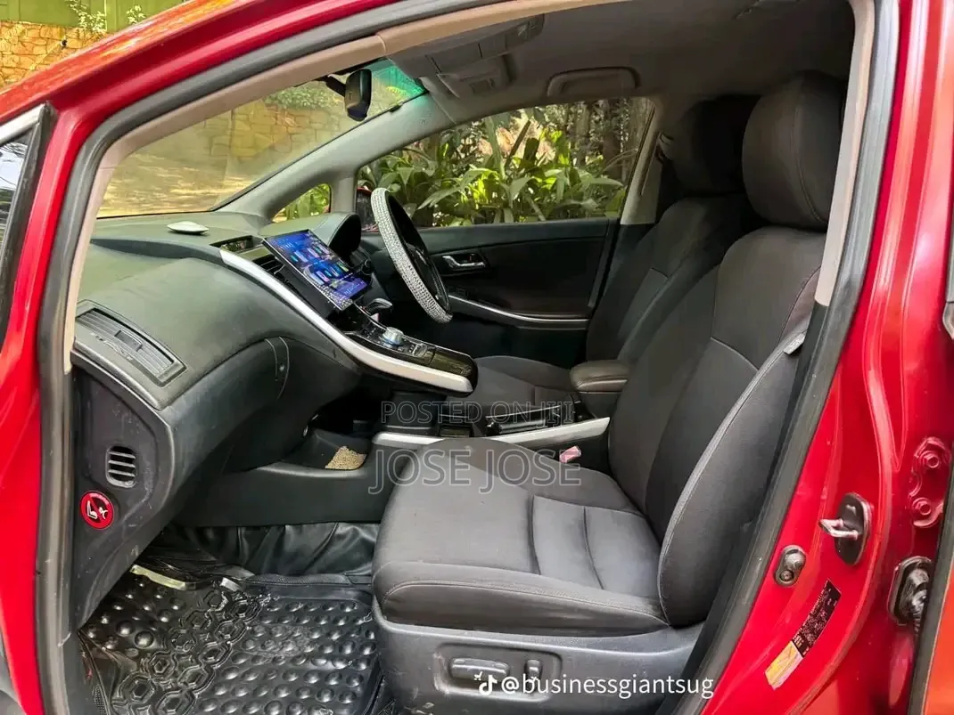 Toyota Corolla Hybrid 2023 Maroon