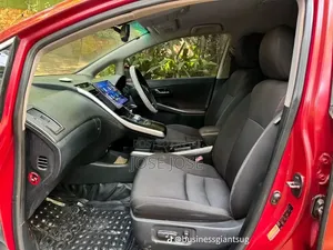 Toyota Corolla Hybrid 2023 Maroon