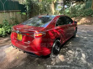 Toyota Corolla Hybrid 2023 Maroon