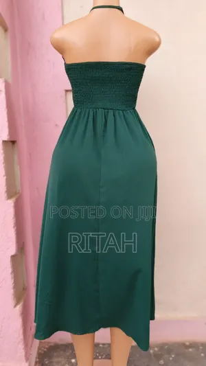 Beautiful Dark Green Smocked Midi Dress With Halter Tie Straps.