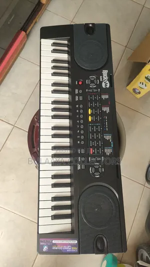 UK Used RockJam RJ549, Compact 49-Key Portable Electronic Keyboard.