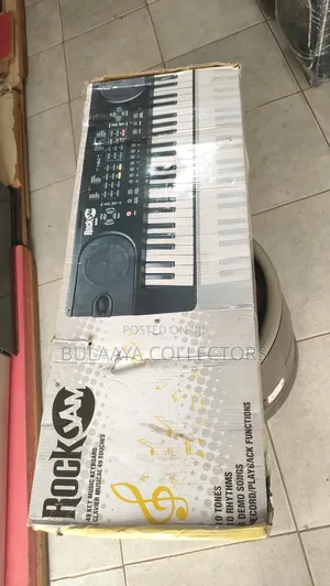 UK Used RockJam RJ549, Compact 49-Key Portable Electronic Keyboard.