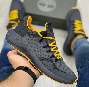 The Timberland Men's FlyRoam Trail Low Sneakers in a Grey