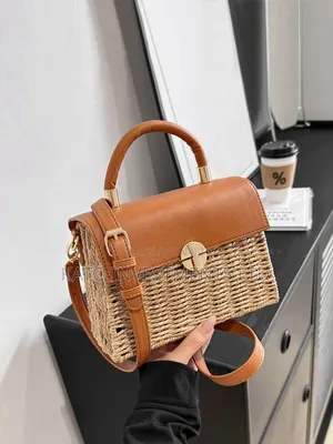 Top-Handle Handbag Featuring a Woven Straw Base in Earthy Tones