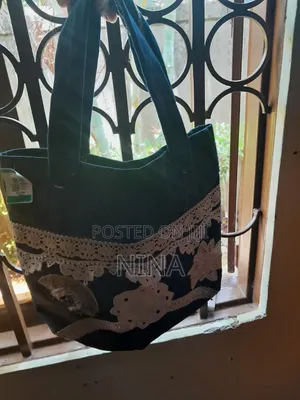 Yanas Tote Bags