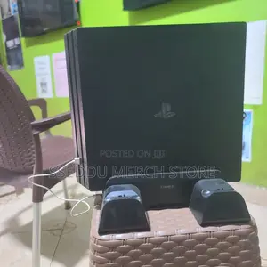 PS4 Pro 2TB | 40 Games + 15 Discs (Inc. Free 3-Fan Cooling Stand))