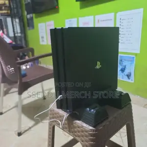 PS4 Pro 2TB | 40 Games + 15 Discs (Inc. Free 3-Fan Cooling Stand))