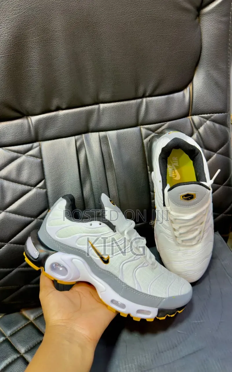 Nike Air Max Plus (Nike TN) in a White, Grey, and Yellow/Orange
