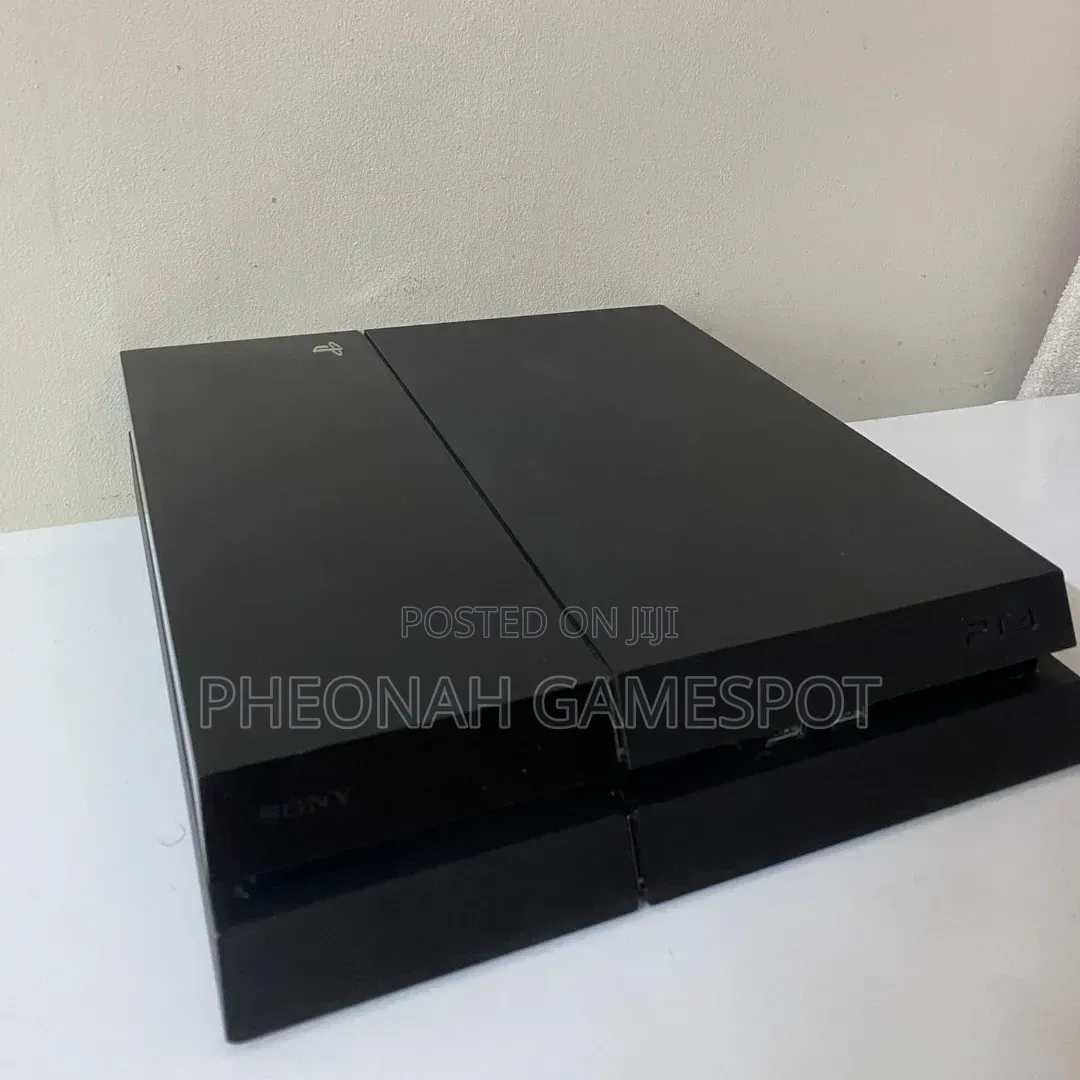 Playstation 4 Standard (PS4 Fat). Chipped Console With 12 Games, 2pads