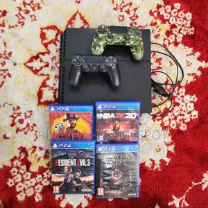 Very Nice, Very Neat Super Clean PS4 Standard With 12 Games and 2 Pads