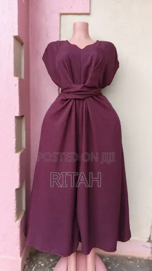 Elegant Plum/Wine-Colored Midi-to-Maxi Dress.