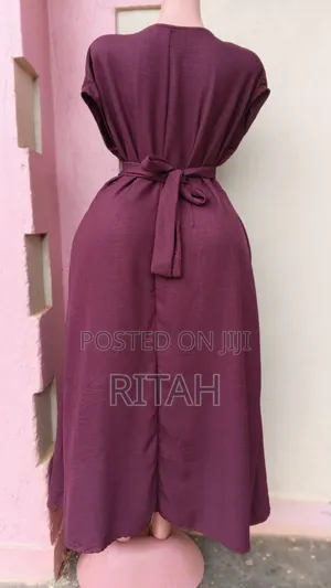 Elegant Plum/Wine-Colored Midi-to-Maxi Dress.
