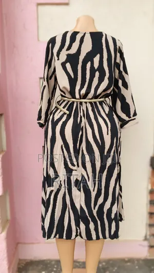 Stylish Black and Beige Animal-Print Midi Dress.