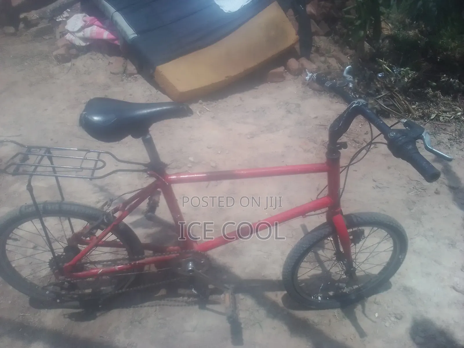 Red 20 Inch Bicycle With Carrier -200k Negotiable