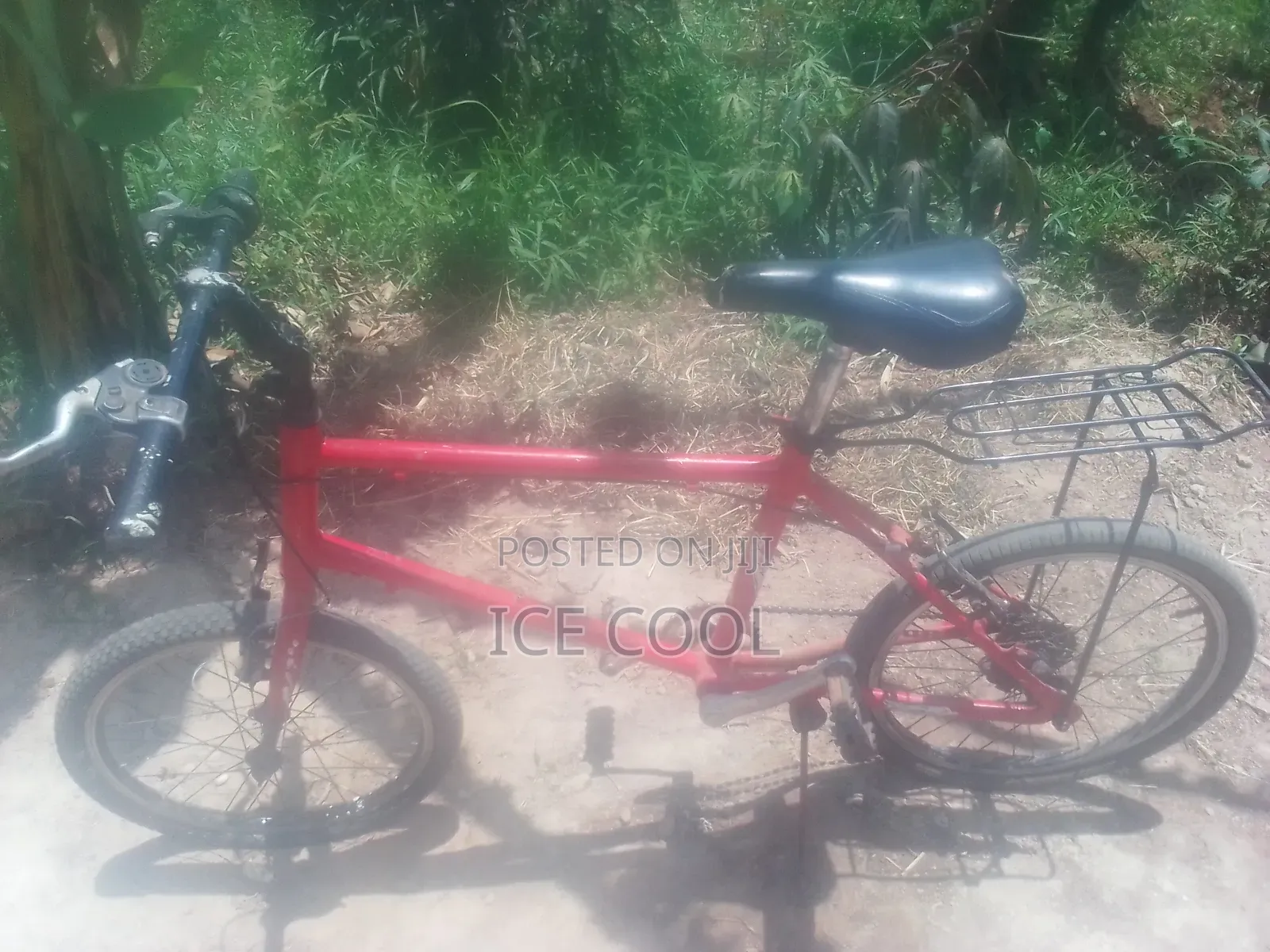 Red 20 Inch Bicycle With Carrier -200k Negotiable