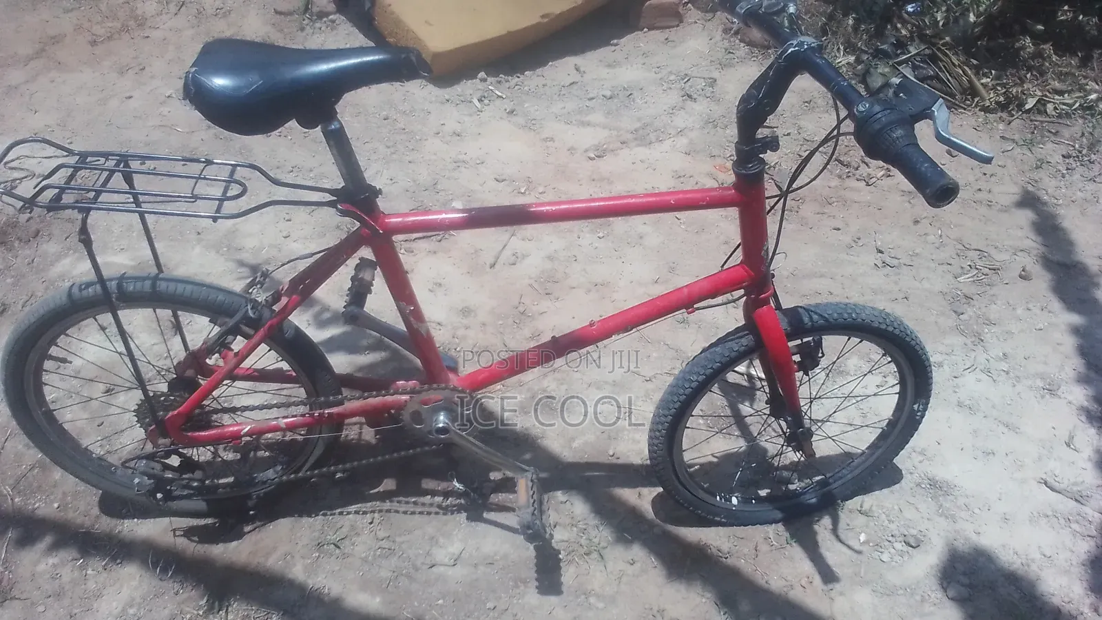 Red 20 Inch Bicycle With Carrier -200k Negotiable
