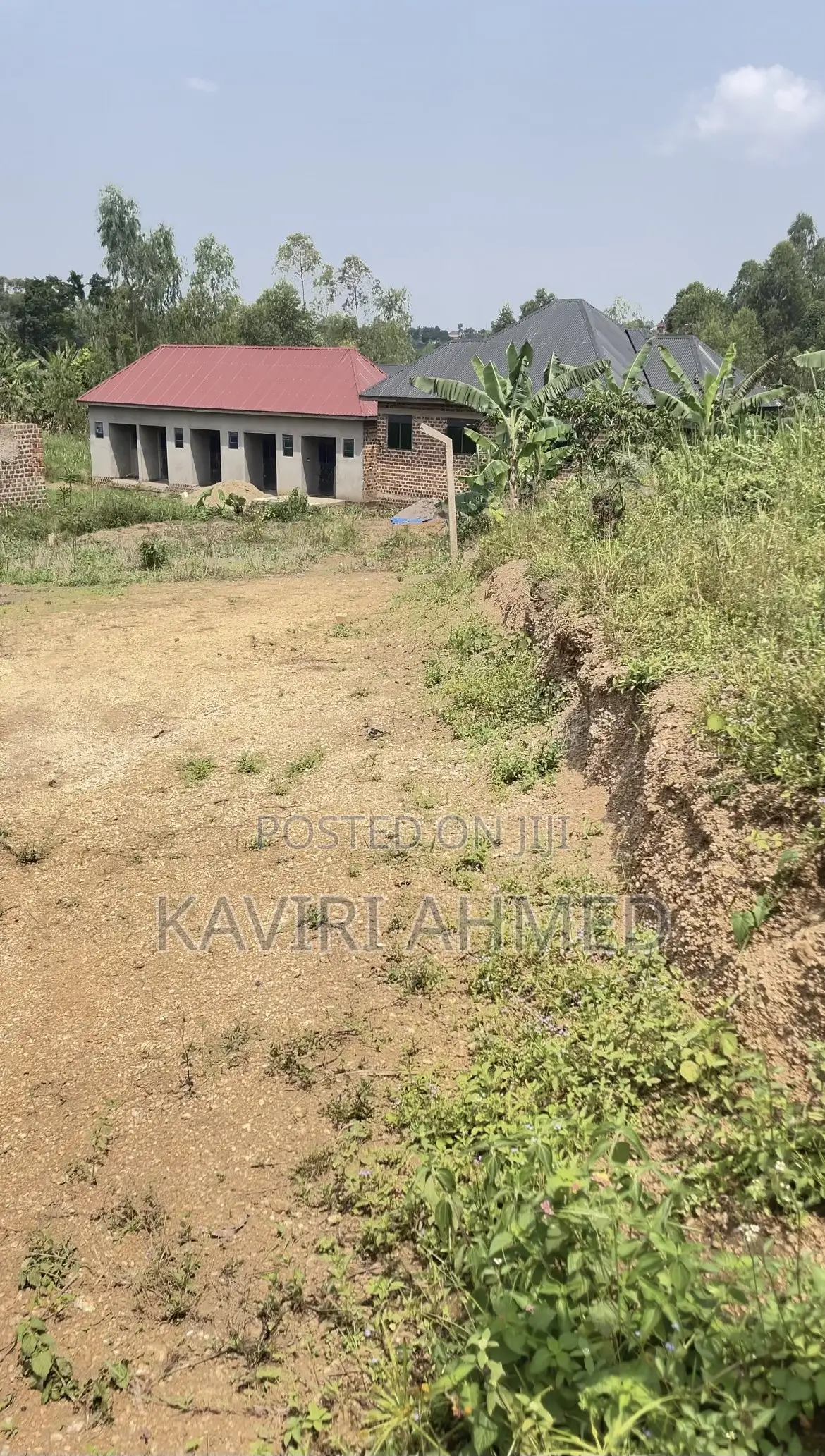 Plot for Sale 50*50*50*70 Buwambo Town 20m Negotiable