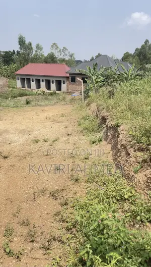 Plot for Sale 50*50*50*70 Buwambo Town 20m Negotiable