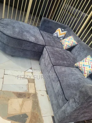 Simple L Shaped Sofa Readily Available in Gray Color