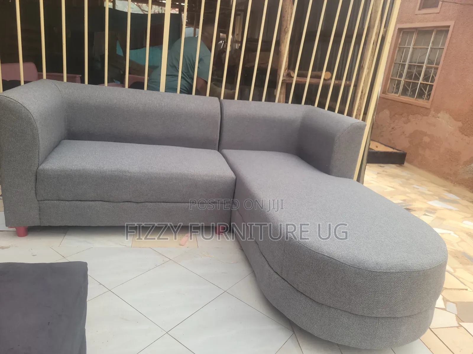 Simple L Shaped Sofa Readily Available in Gray Color