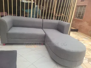 Simple L Shaped Sofa Readily Available in Gray Color