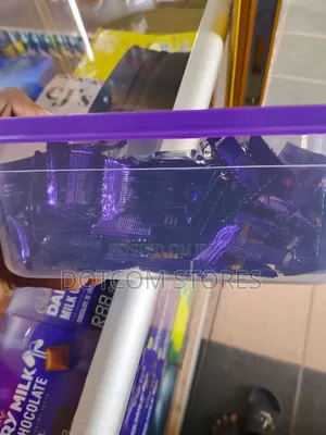 Red/Purple Plastic Tub of Ambic Nutty Bar Chocolate (Nuts & Chocolate)