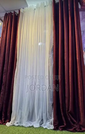 Apair of Curtain With a Net