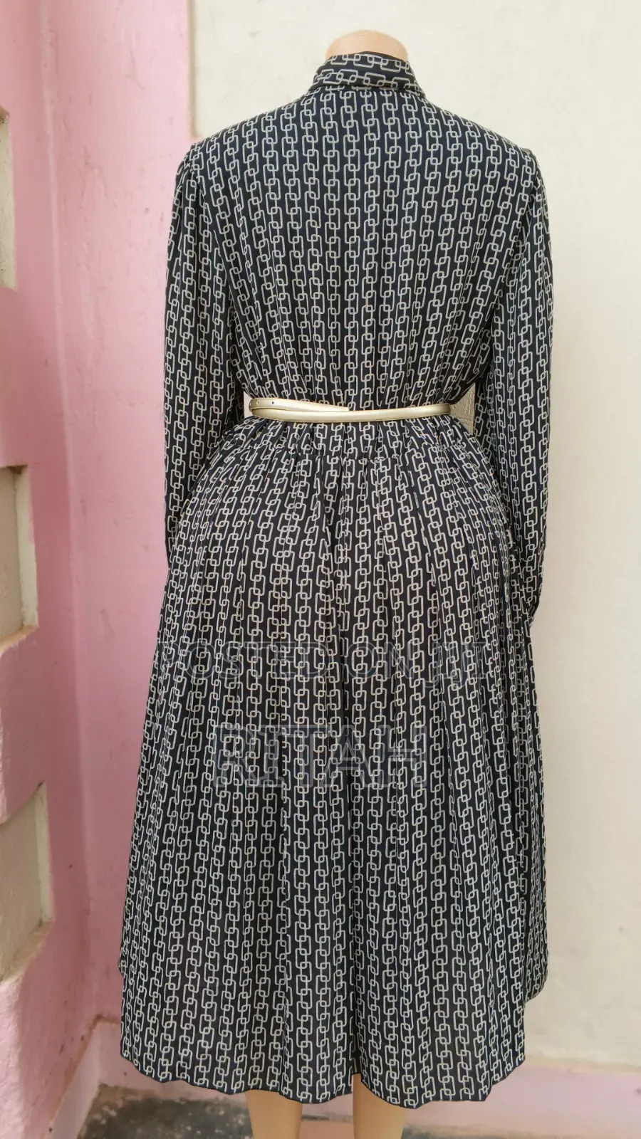 Elegant Black and White Printed Long-Sleeve Midi Dress With Tie Neck
