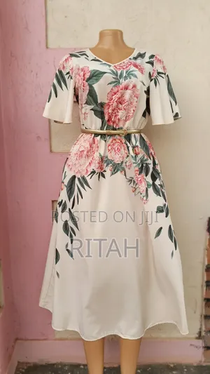 Elegant Cream Floral Maxi Dress With Flared Sleeves