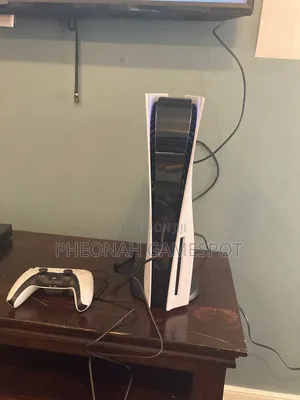 PS5 Standard Bundle With Two Controllers and Games for Busy Kampala