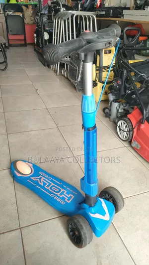UK Used Globber Primo Foldable Sky-Blue 3-Wheel Kick Scooter.
