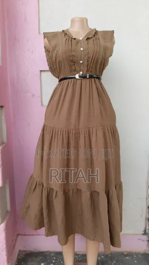 Elegant Brown Sleeveless Midi Dress With Lace Details