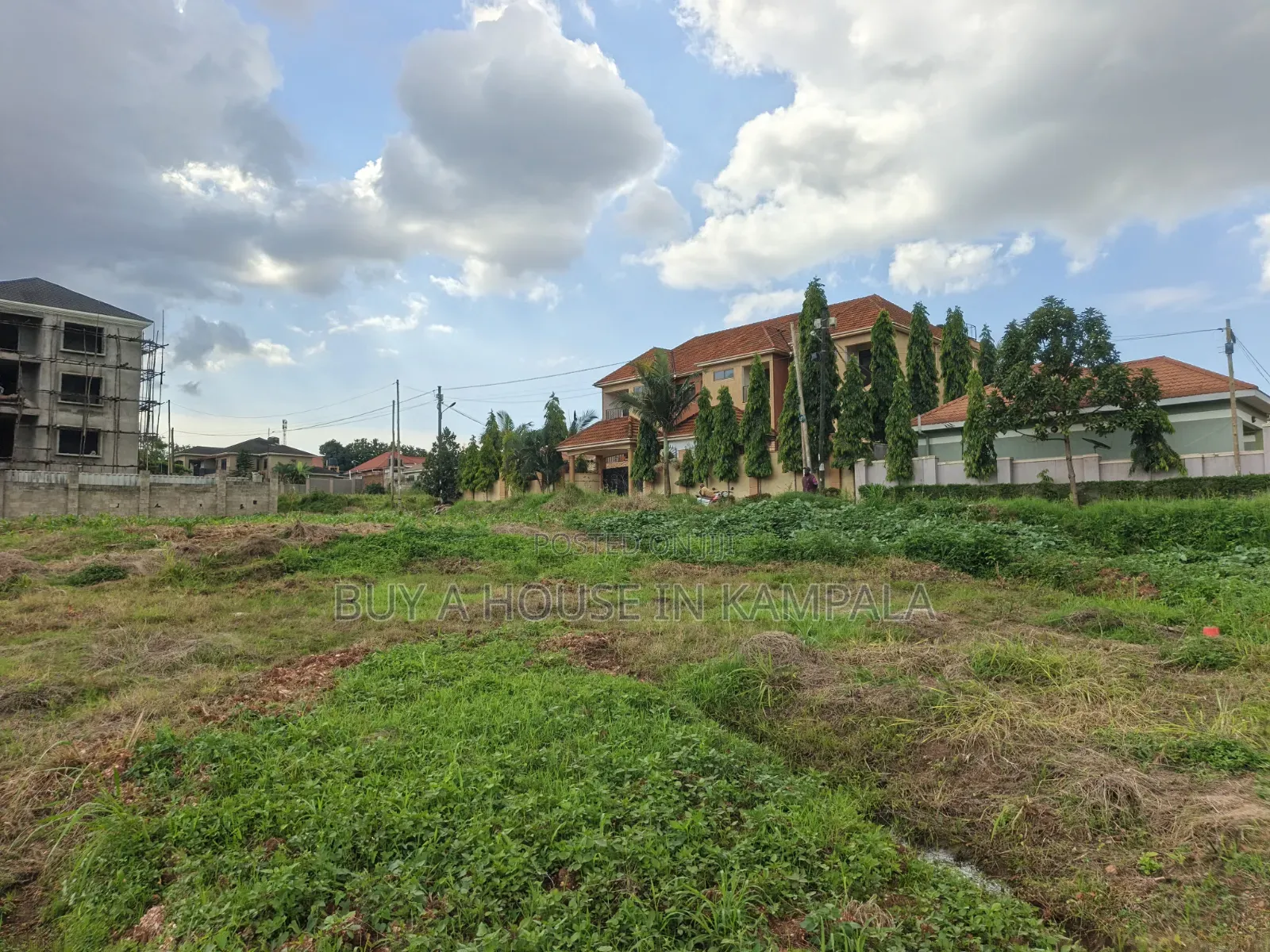 Namugongo Opposite Matyrs Shrine 100×100feet Titled Land Onsale 140m