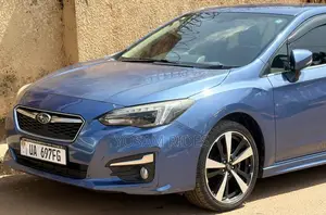 Subaru Impreza 2.0i Limited PZEV 4dr Hatchback AWD (2.0L 4cyl CVT) 2015