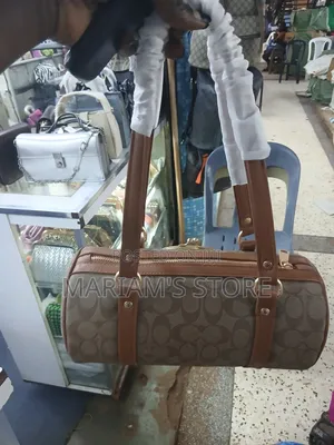aCoach Kisslock Barrel Bag
