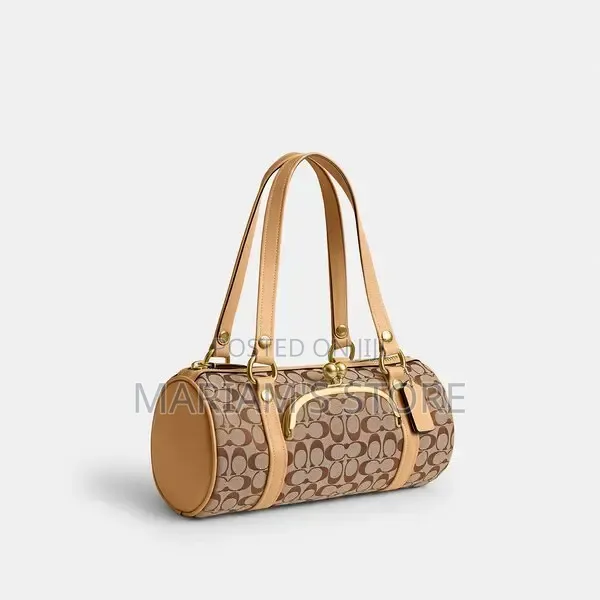 aCoach Kisslock Barrel Bag