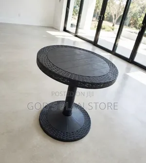 Brown Round Pedestal Plastic Table